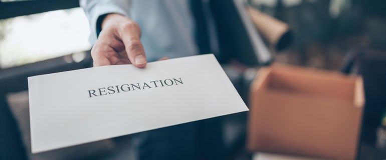 A person with a resignation letter