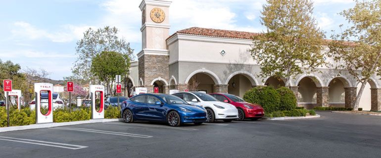 Tesla Superchargers Charging EVs