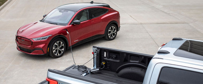 https://www.convenience.org/getmedia/75641df9-7c2f-481a-bee1-640cb9ccf871/Vehicle-to-Vehicle-Charging_01_770x320_Ford_EV.jpg