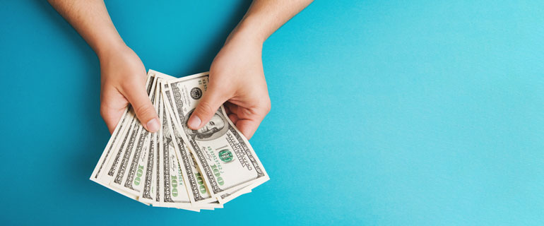 https://www.convenience.org/getmedia/75fd28b1-9b2e-4ceb-ad38-2ad7cb1ab838/young-person-holds-cash.jpg